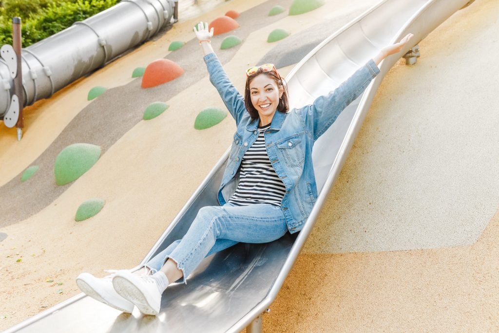 Woman-on-Slide-scaled.jpg