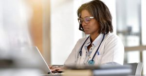doctor-at-computer_adobe.jpg